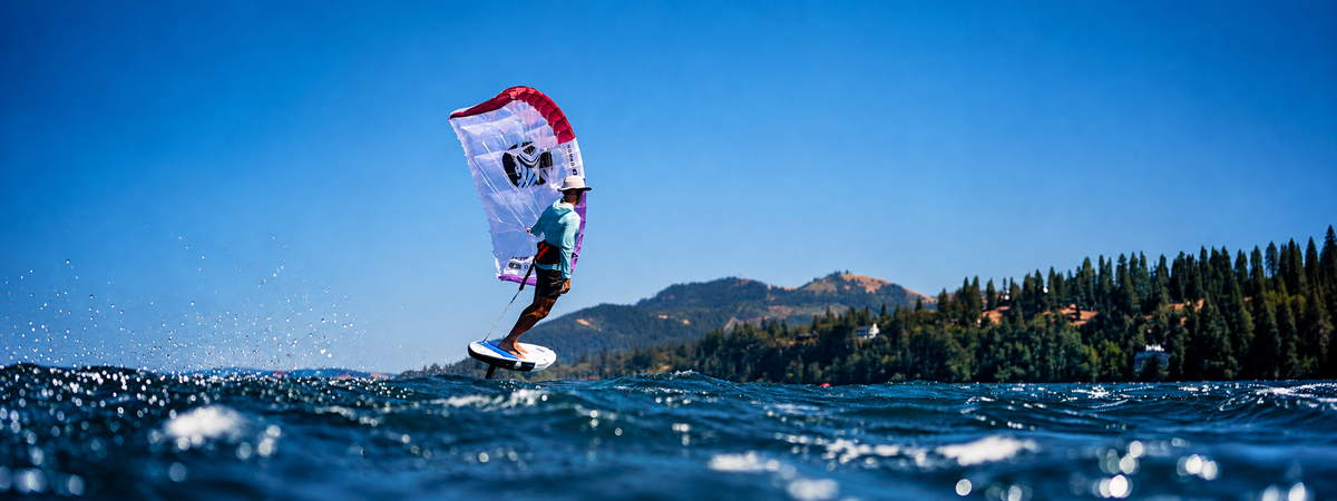 Cabrinha Nomad Parawing rider enjoying a hydrofoil session on open water.